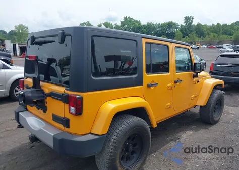 2013 Jeep Wrangler Unlimited Sahara из США, поврежденный, VIN 1C4HJWEG5DL560447